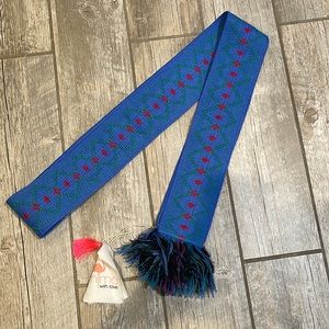 Embroidered blue fabric belt.  Nimo with love brand.